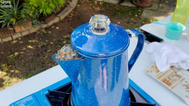 The GSI Outdoors 8-Cup Enamelware Percolator boiling over.
