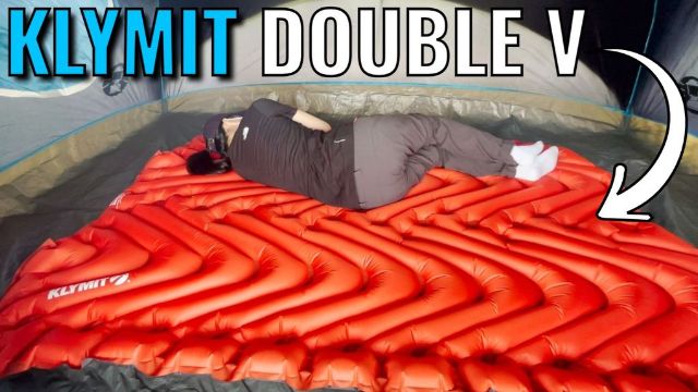 This is a picture of me lying down on the Klymit Double V Insulated 2-Person Sleeping Pad.