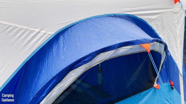 One of the pull-out windows of the Columbia Mammoth Creek 10-Person Tent in the rain.