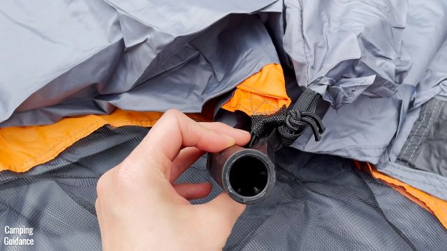 This is a picture of me holding one of the pole joints of the Core 10-Preson Straight Wall Cabin Tent. You can see the small protrusions inside the pole joint.