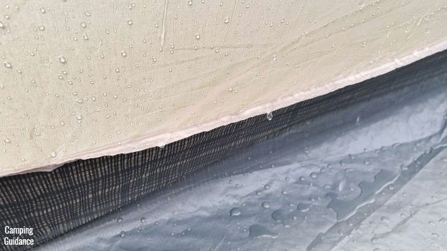 The inverted seam connecting the dark brown fabric of the WeatherMaster 10-Person Tent to the bathtub flooring was not seam taped by Coleman, so water started leaking in during the heavy rain.