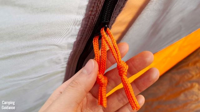 This is a picture of the 2 window zippers of one of the windows of the Core 10-Person Straight Wall Cabin Tent.