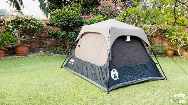 The Coleman Instant Tent 4 in my yard in light rain.