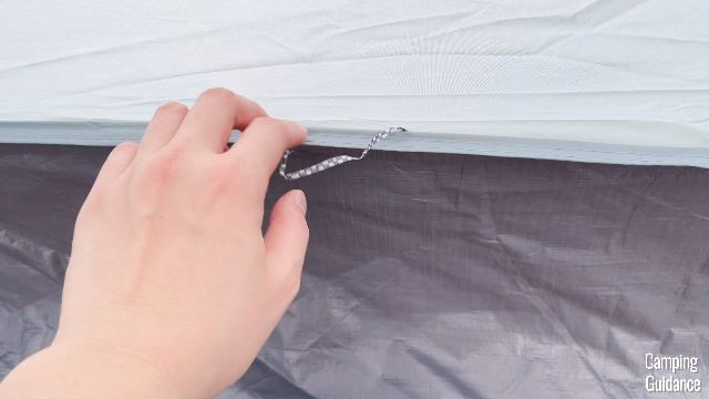 A single loose thread in the Coleman Skydome Tent.