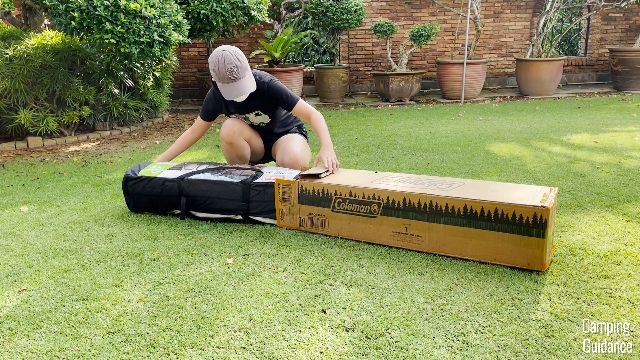 This is a picture of me unboxing the Coleman Instant Tent 4 from its original packaging.