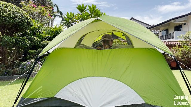 This is a picture of me in my Coleman Sundome 2-Person Tent with the back window open.