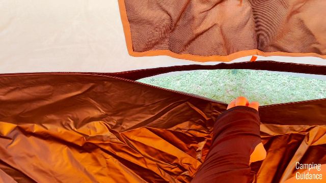 Detaching the removable floor of the Gazelle T4 Hub Tent from the Velcro
