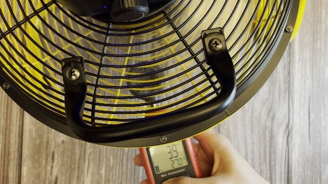 The author measuring the fan speed of the Geek Aire Portable Camping Fan.