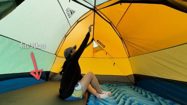 The author is sitting under the peak height inside the Kelty Wireless 4.