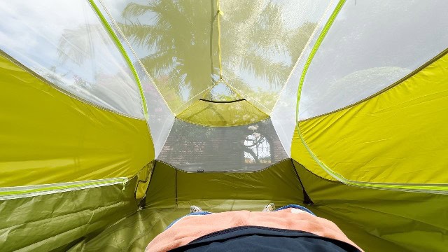 The author lying in the Nemo Aurora 2 without its rainfly.