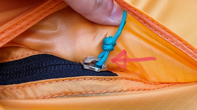 The zippers of the REI Arete ASL 2.